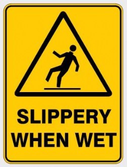 WARNING - SLIPPERY WHEN WET SIGN